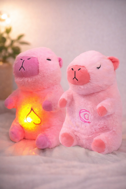 Peluche capybara rose pour bébé avec effet respirant apaisant