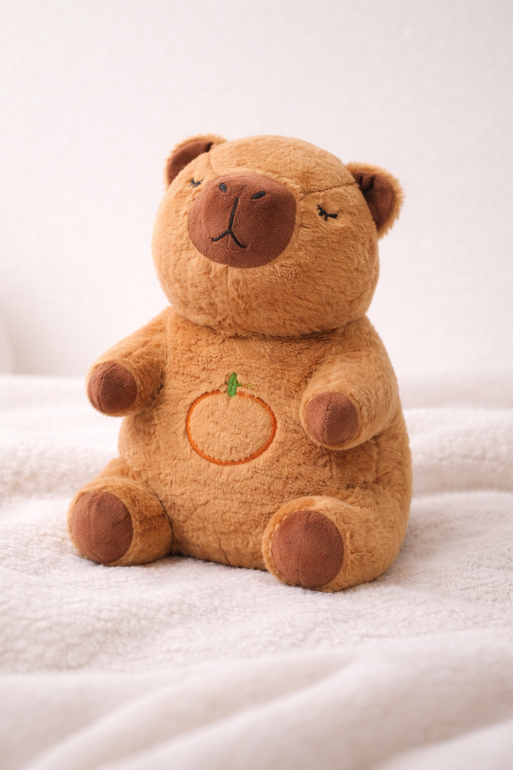Peluche capybara brune pour bébé avec effet respirant apaisant