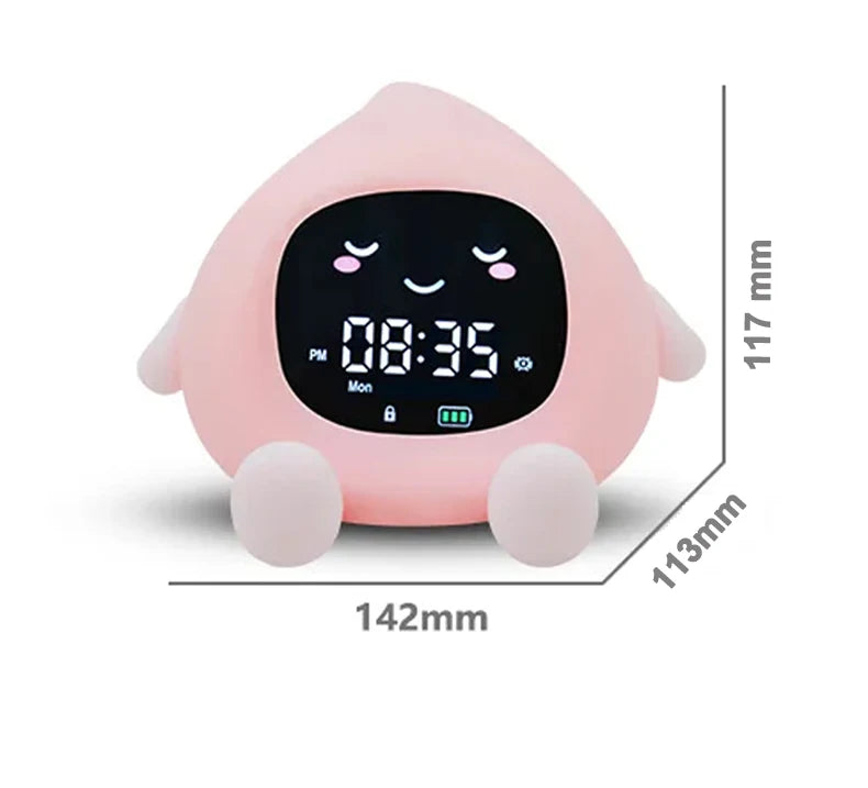Réveil enfant veilleuse LED en forme kawaii avec lumière douce et écran digital sur table de nuit.