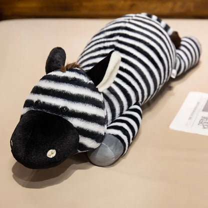 Peluche zèbre XXL ultra douce disponible en 40, 60 et 90 cm, idéale comme coussin de corps, décoration de chambre ou cadeau.