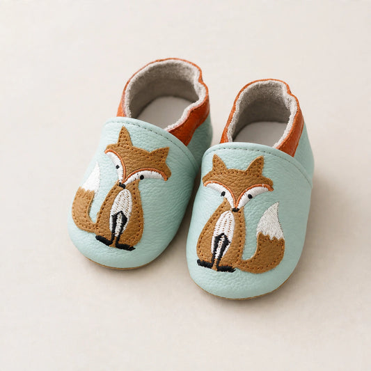 Non-slip baby moccasins in genuine leather