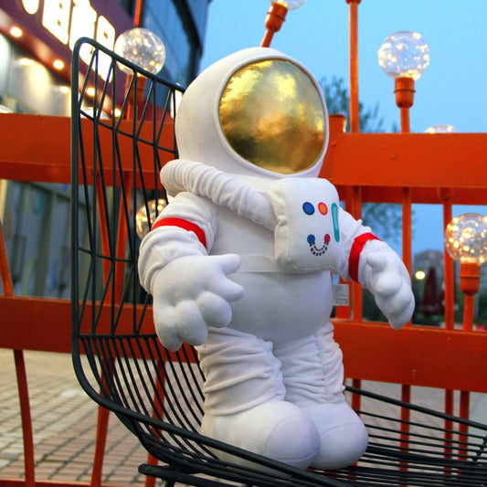 Plush astronaut and rocket
