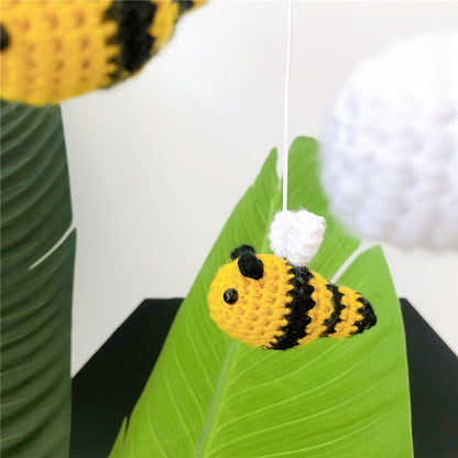 Mobile with knitted bees