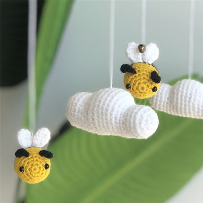 Mobile with knitted bees